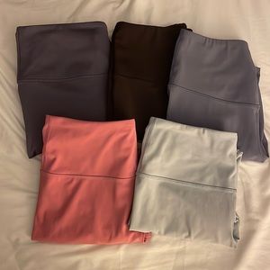 Five pairs of 90 degree by reflex workout pants